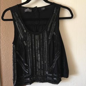 Angie black sequence top